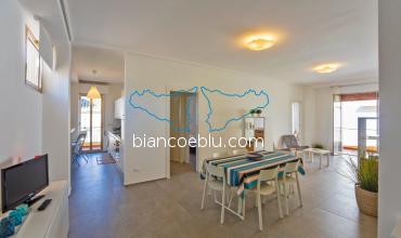 Crono Crono new holiday apartment to let facing the sea in the centre of Marina di Ragusa living room and dining room