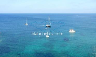 view of portopalo sea with boats 