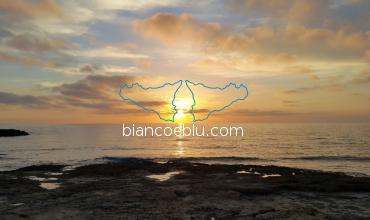 beautiful sunset in punta secca facing montalbano house