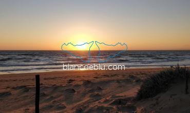 from randello the sunset seen from the dunes behind the golden beaches 