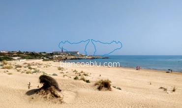 in sampieri very wide beaches with sandy natural dunes