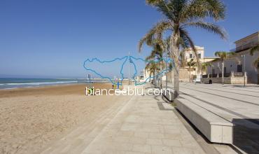 sandy beach and new pedestrian area in marina di ragusa