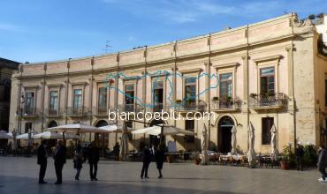 in syracuse main square many baroque buildings 